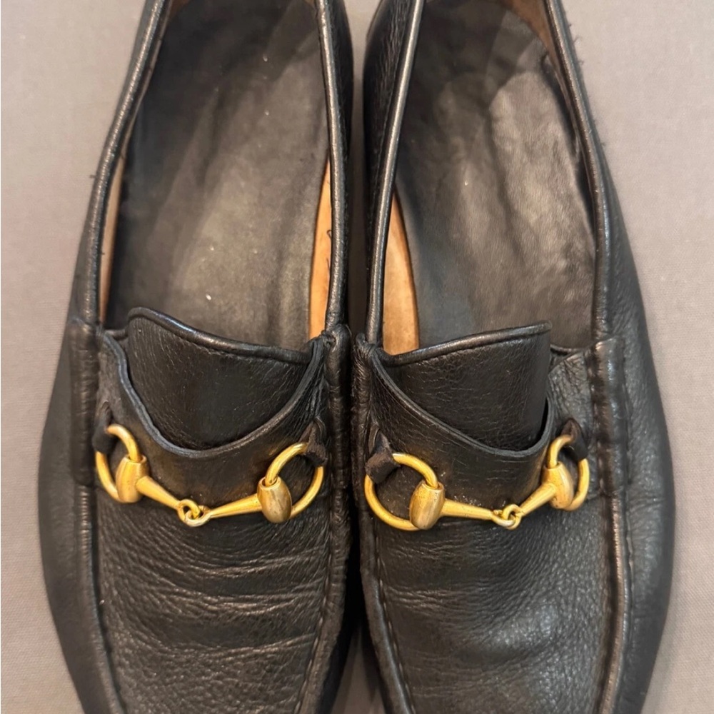Black Leather Loafers with Gold Detailing